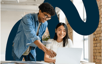 Two interns work on a project.
