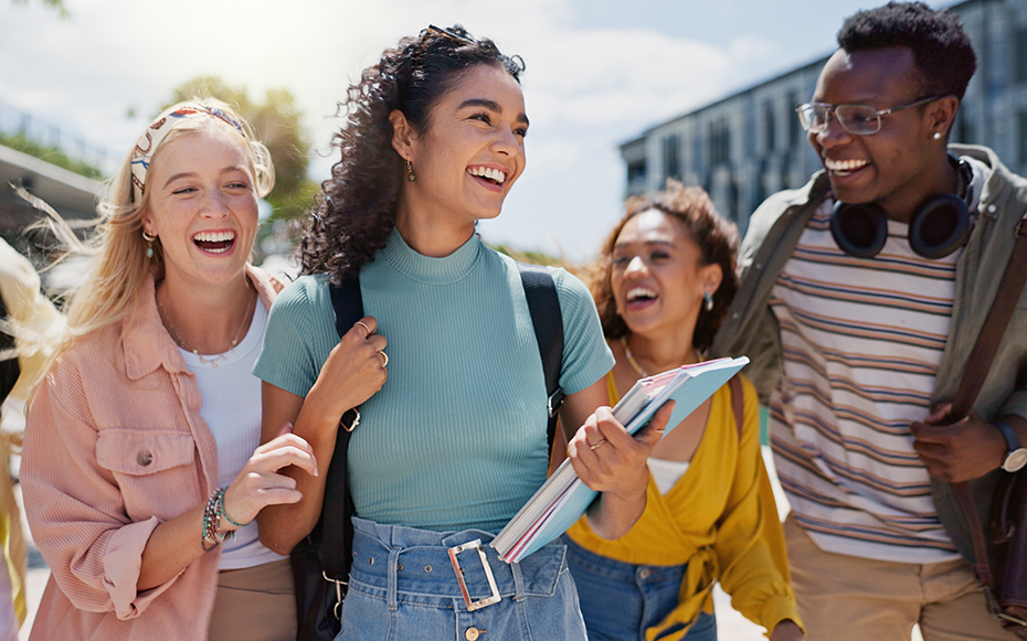 Students on campus walking to a career fair.