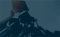 Graduates lifting their grad caps.