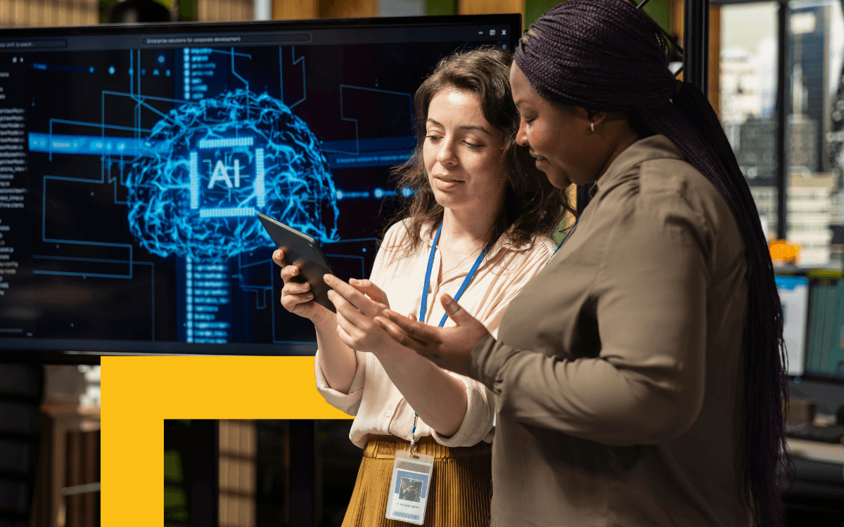 Two career services professionals review a report.