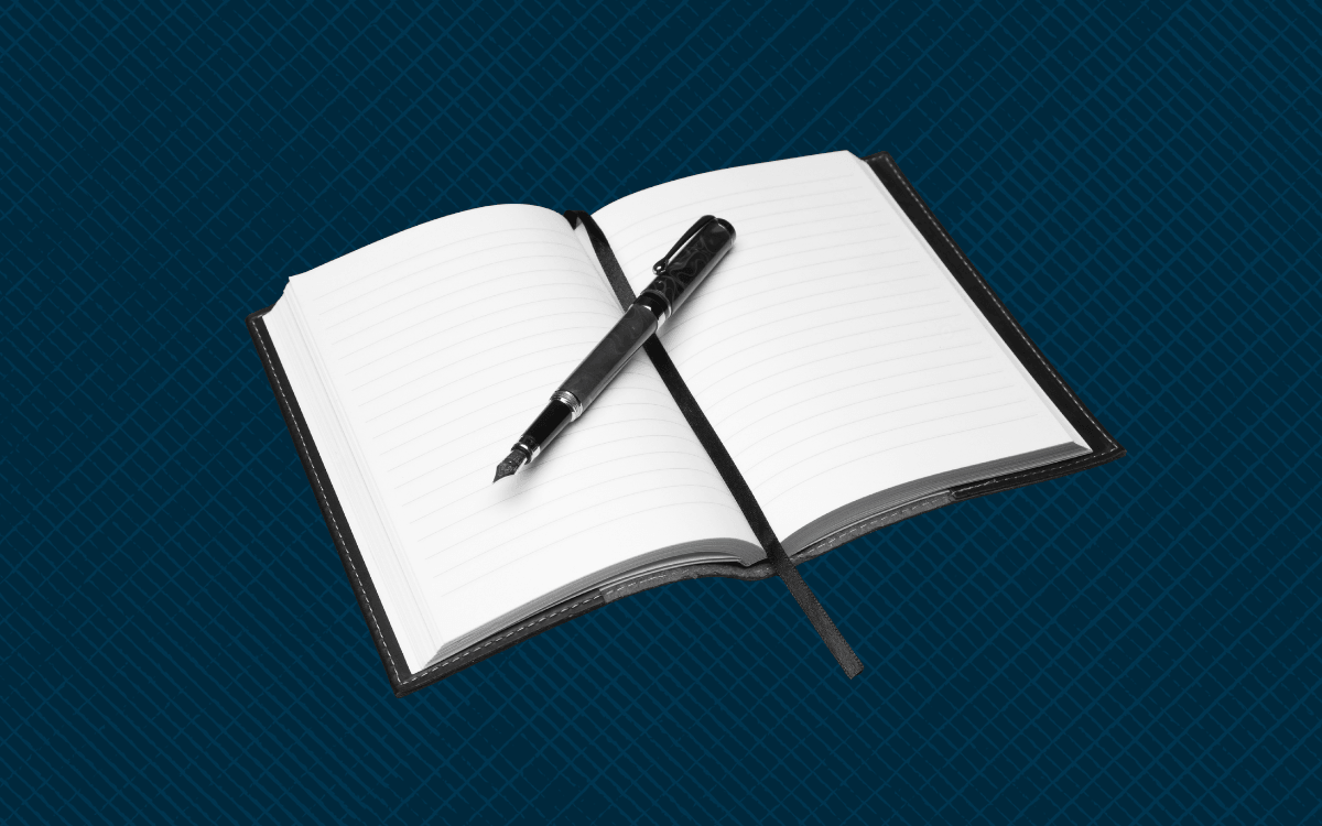 An image of a journal on a dark blue background.