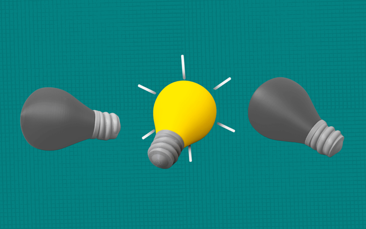 Three lightbulbs -- two are gray and one is yellow.