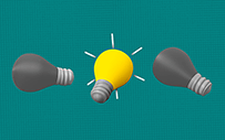 Three lightbulbs -- two are gray and one is yellow.