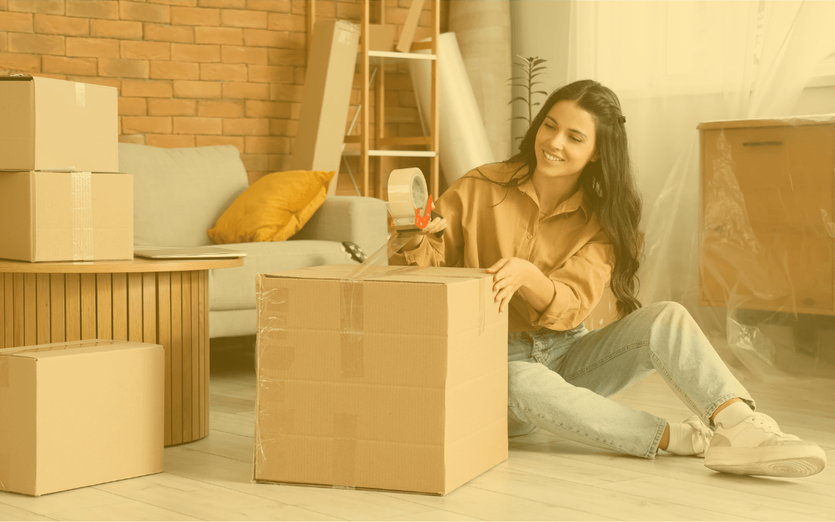 A girl packs up her apartment.