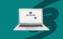A laptop showing a job search website.