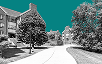 A pathway winds through a college campus.