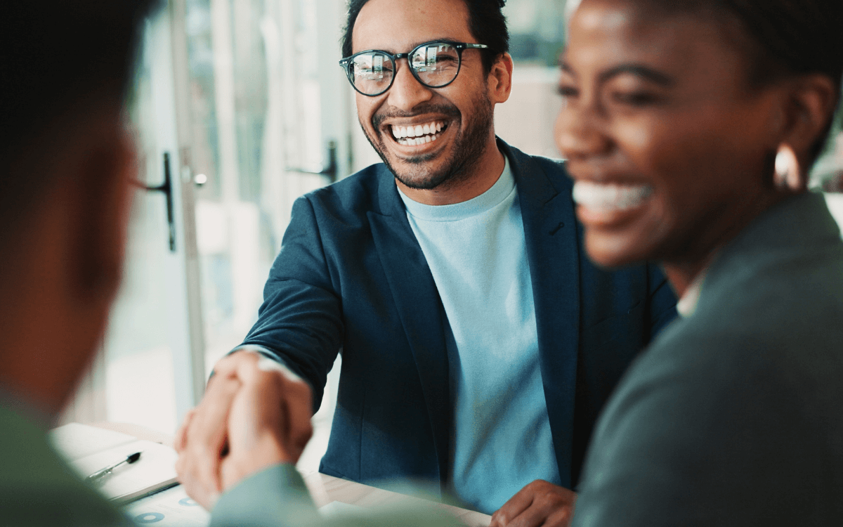 Recruiters meet with a job candidate.